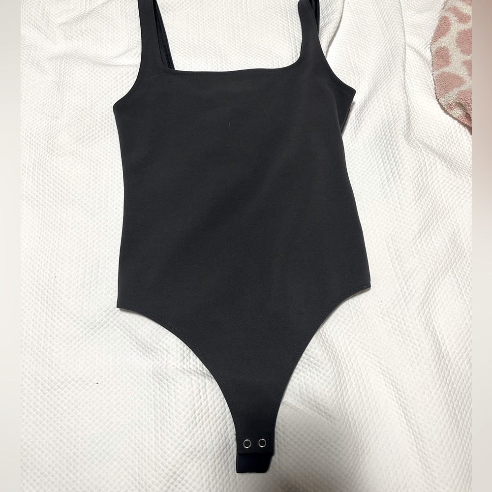 Express Grey bodysuit. Looks darker but is a little lighter grey than pictured.